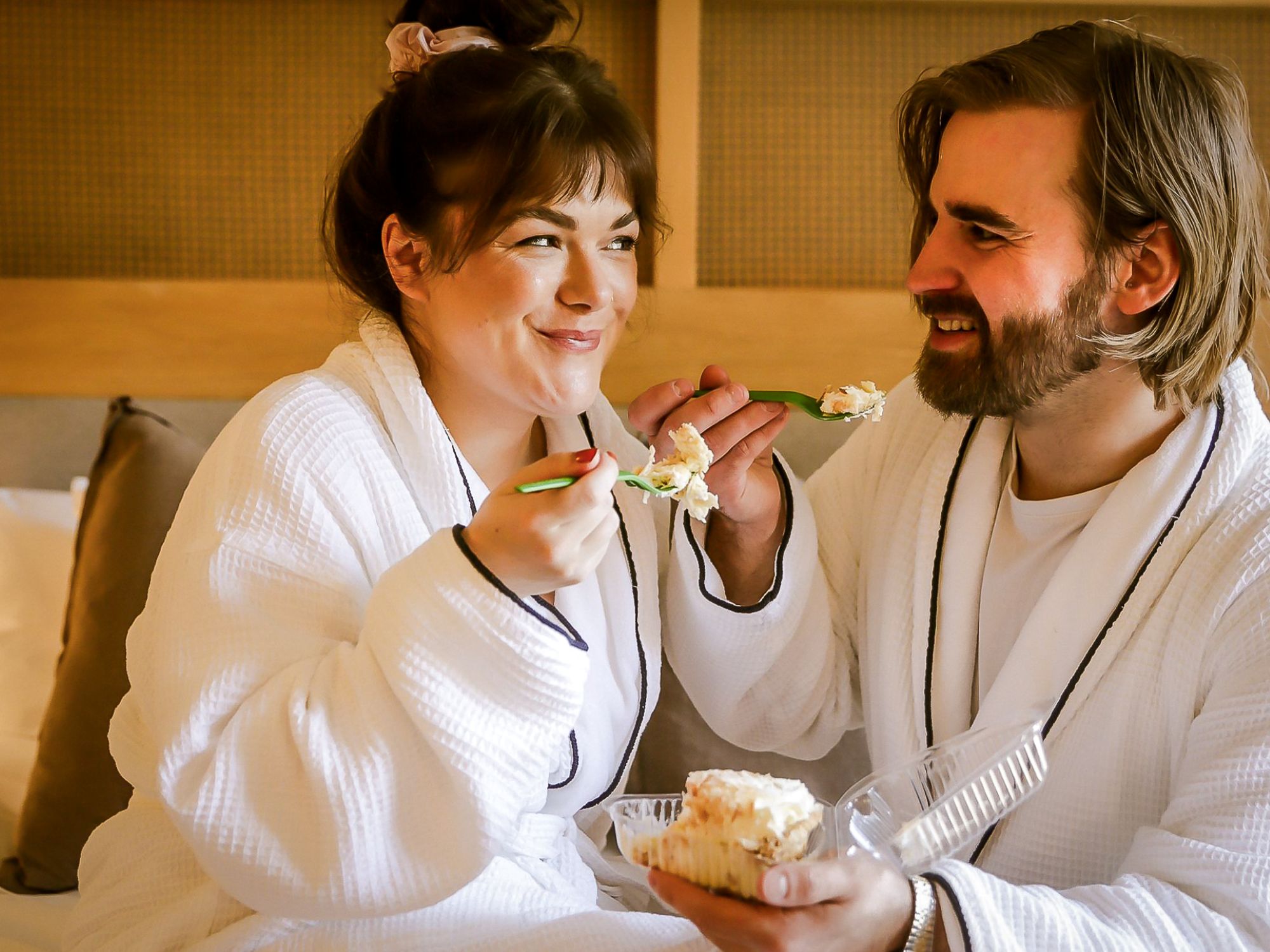 IMG_5109-Resized and Edited 3 Couple in white hotel robes enjoying dessert together in a cozy Seattle hotel room